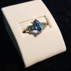 10k blue topaz and diamond accents
